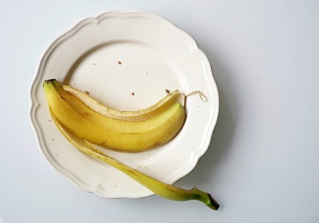 Empty banana peel on a plate