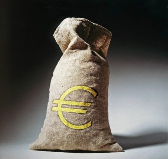 Filled moneybag made of jute with euro sign