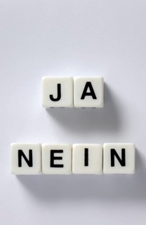 Dice with yes and no lettering