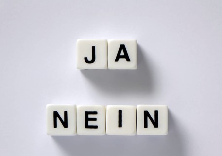 Dice with yes and no lettering