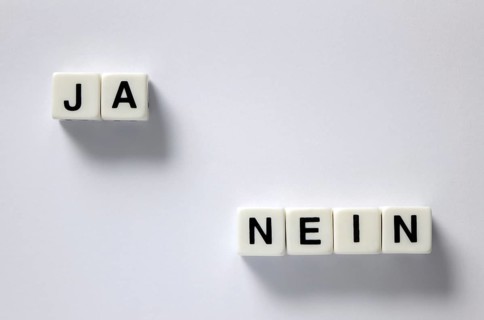 Dice with yes and no lettering