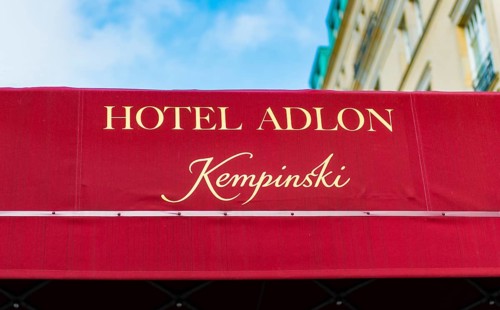 Awning at the entrance with inscription Hotel Adlon Kempinsky