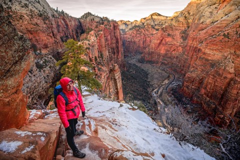 Young woman descending from Angels Landing