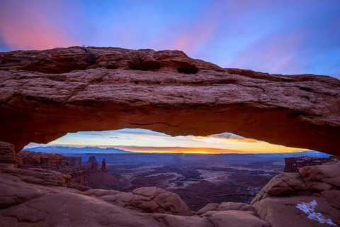 View through arch Mesa Arch at sunrise