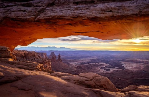 View through arch Mesa Arch at sunrise