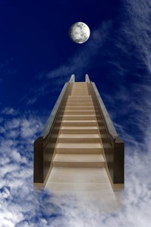 Long staircase leading up into the dark blue sky with moon and clouds