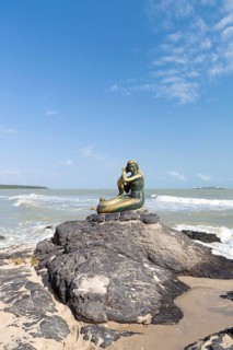 Golden mermaid sculpture on Samila beach