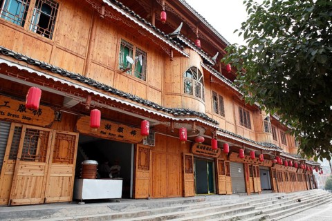 Traditional wooden house with Chinese shops in the Miao village