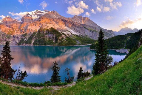 Mountains in evening light on Oeschinen Lake