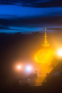 Illuminated Golden Rock at night with Kyaiktiyo Pagoda