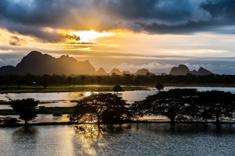 Sunset above tower karst mountains