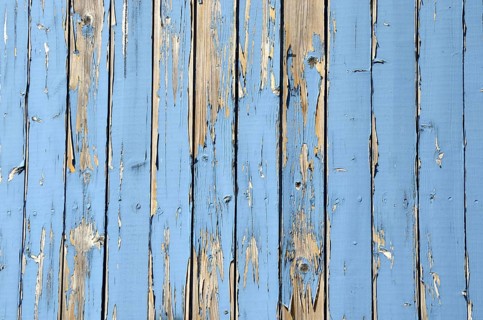 Wall made of light blue wooden slats