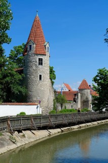 City wall and towers by the river Abens