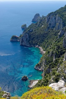 View from the park on cliff with Faraglioni rocks