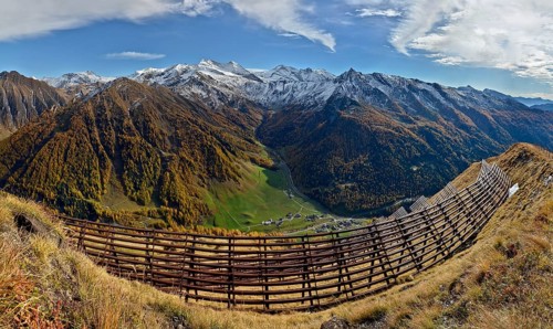 Alpine landscape with avalanche barricades