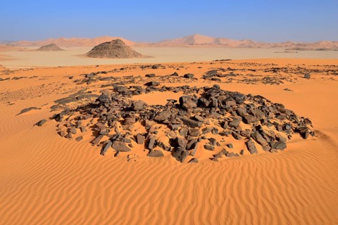 Tumulus burial mound in the sanddunes of Oued In Djerane