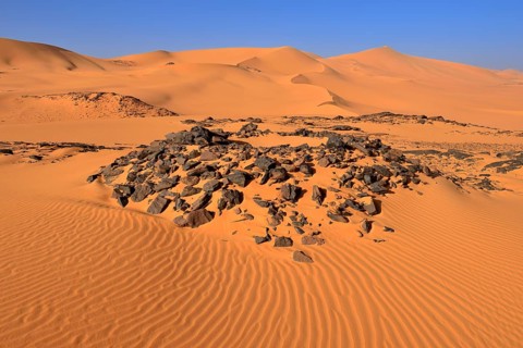 Tumulus burial mound in the sanddunes of Oued In Djerane