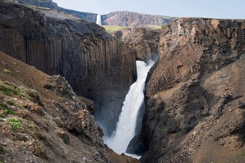 Waterfall Litlanesfoss between basalt columns