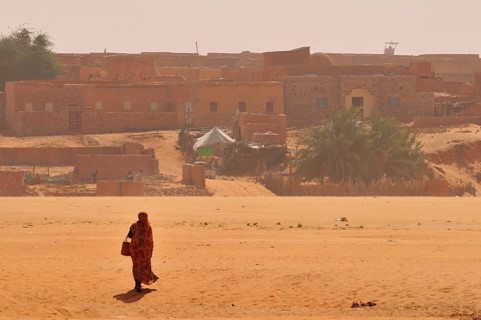Woman in a dry riverbed