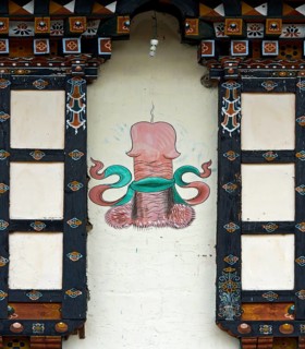 Phallus mural on residential house facade