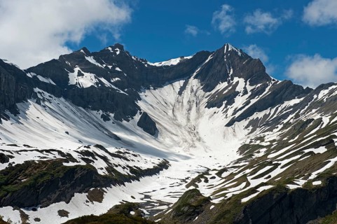 Kar with snow below the mountain peak Mont Sagerou and Dent de Barme