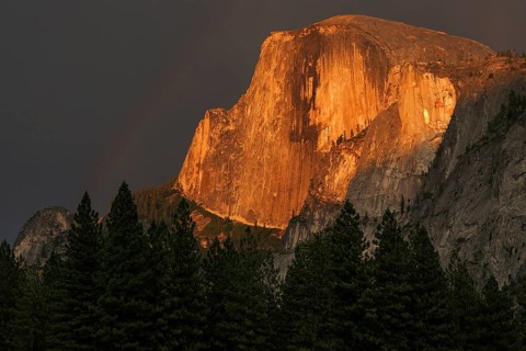 Half Dome illuminated by setting sun