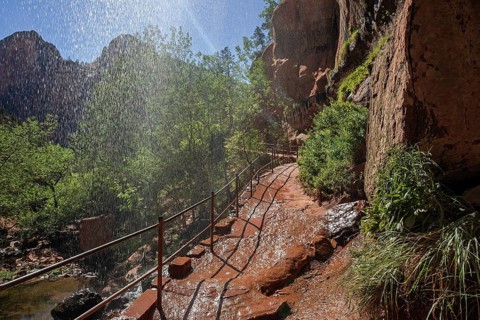 Waterfall above overhanging rock