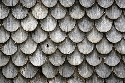 Old wood shingles on a farmhouse
