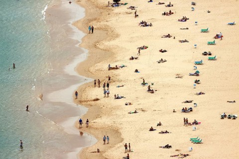 People lying on the beach