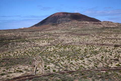 Barren landscape and volcanic mountain Arena in Villaverde