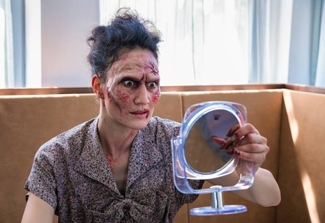 Zombie looks in the mirror