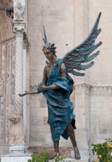 Blue angel in front of Verona Cathedral