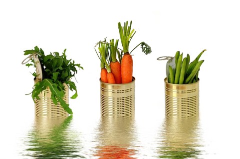 Three food cans with carrots