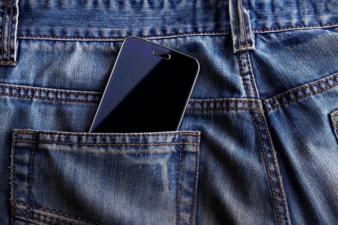 Smartphone in the pocket of jeans