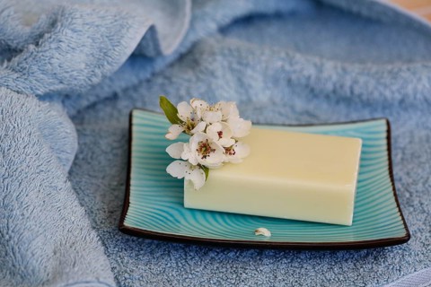 Soap piece with flower in soap dish