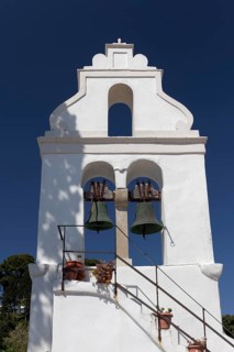White bell tower of Vlacherna Monastery