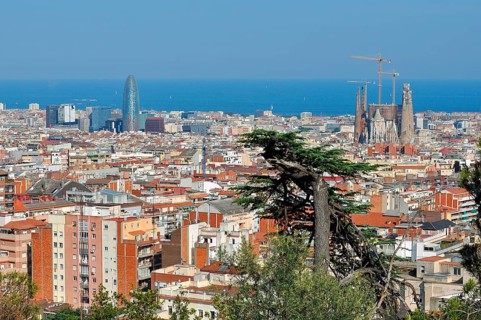 View from the Parc Guell towards the city with Sagrada Familia and Torre Agbar