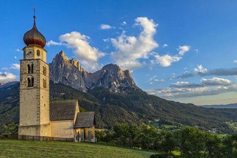 San Valentino church in front of the Schlern at sunset