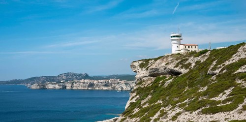 Lighthouse by the steep coast