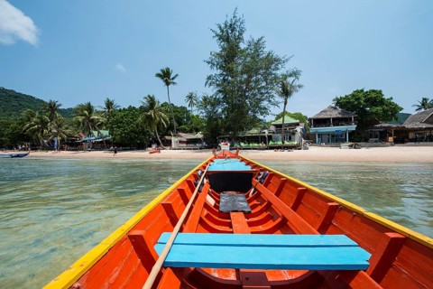 Bow of longtail boat in sea