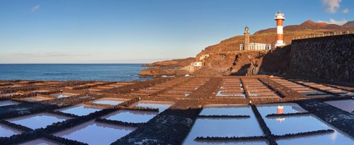 Saltworks Teneguia in front of Faro de Fuencaliente lighthouse