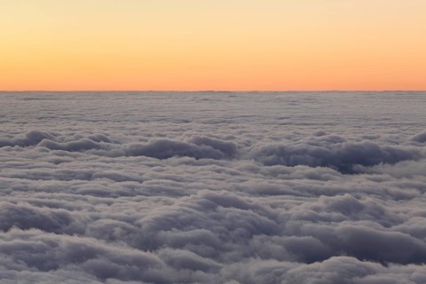 Sunset above the clouds