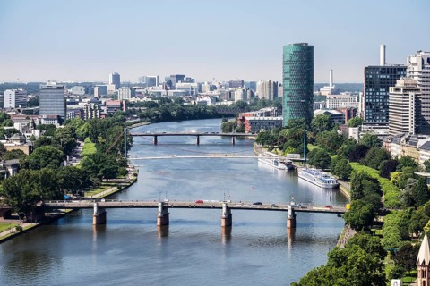 Main river with Untermainbrucke and Holbeinsteg bridges and Westhafen Tower