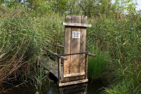 Small jetty with a sign