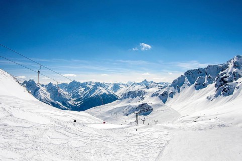 Panoramic view into the Swiss Alps ski resort Motta Naluns