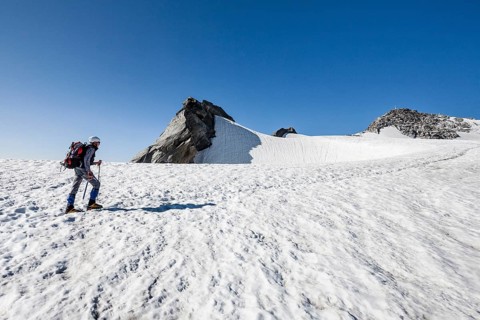 Mountaineer on Schwarzenstein summit ridge