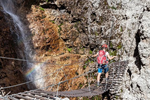 Climbers on suspension bridge
