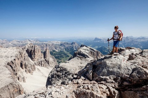 Mountaineer ascending of the Piz Boe on the Vallonsteig in the Sella group