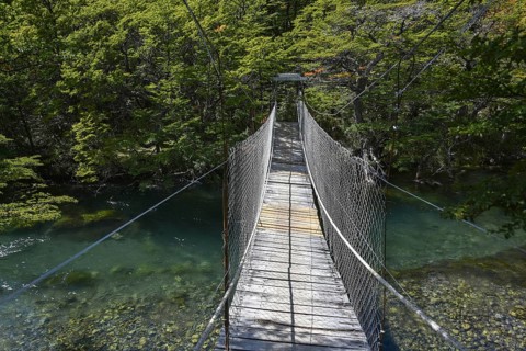 Suspension bridge at the footpath to Glaciar Huemul at Lago del Desierto
