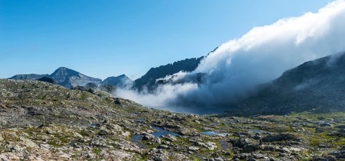 Clouds passing over Bergkam with small mountain lakes